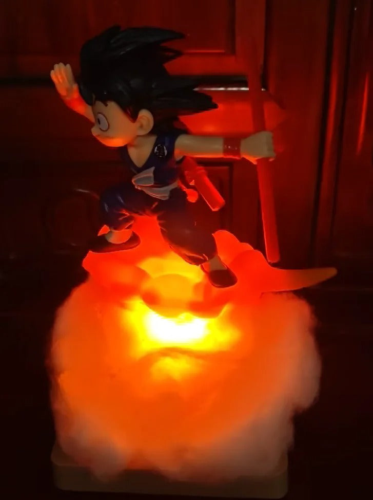 Sangohan vole sur nuage magique lumineux bâton rouge main